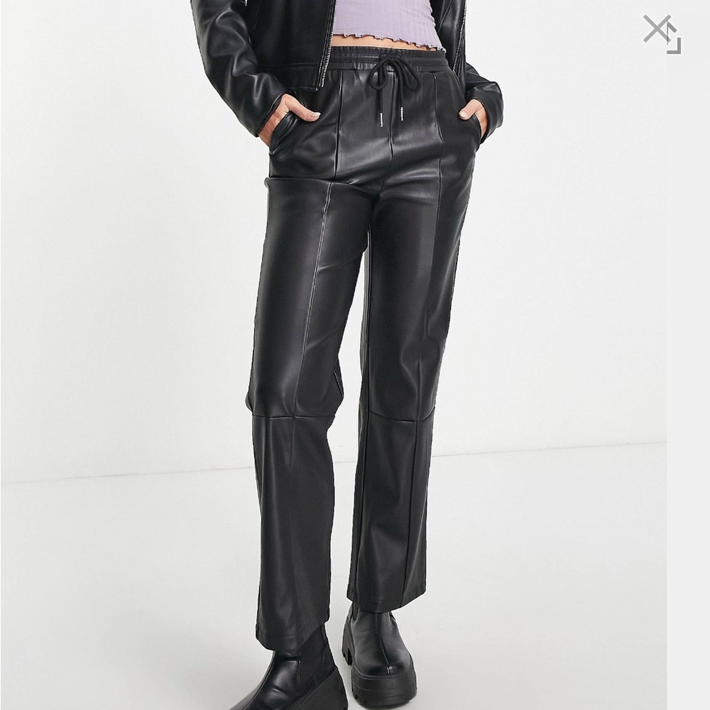 Tall faux leather peg pant in black. Sz 12 never worn.